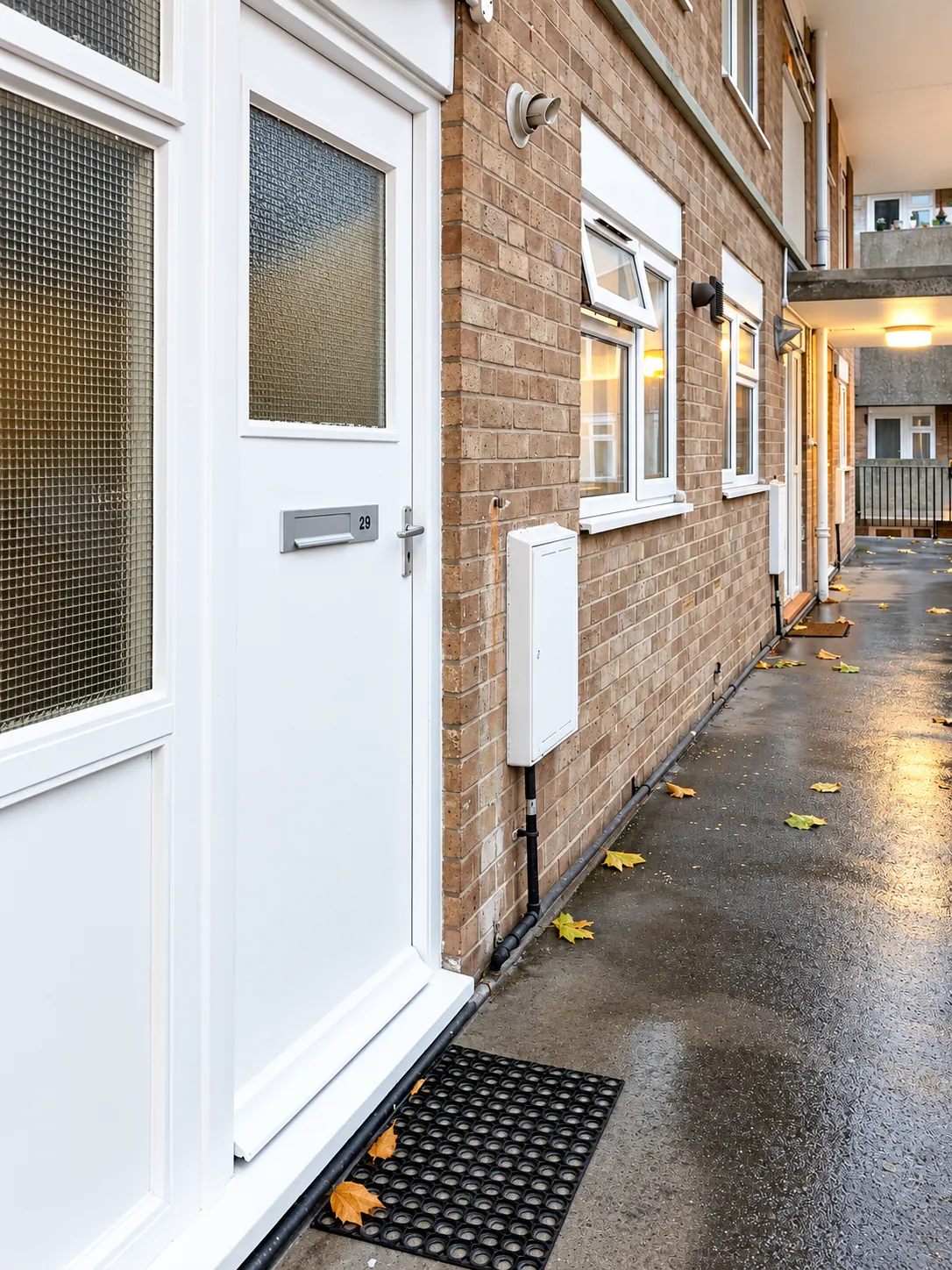 Side view of the entrance path along the building